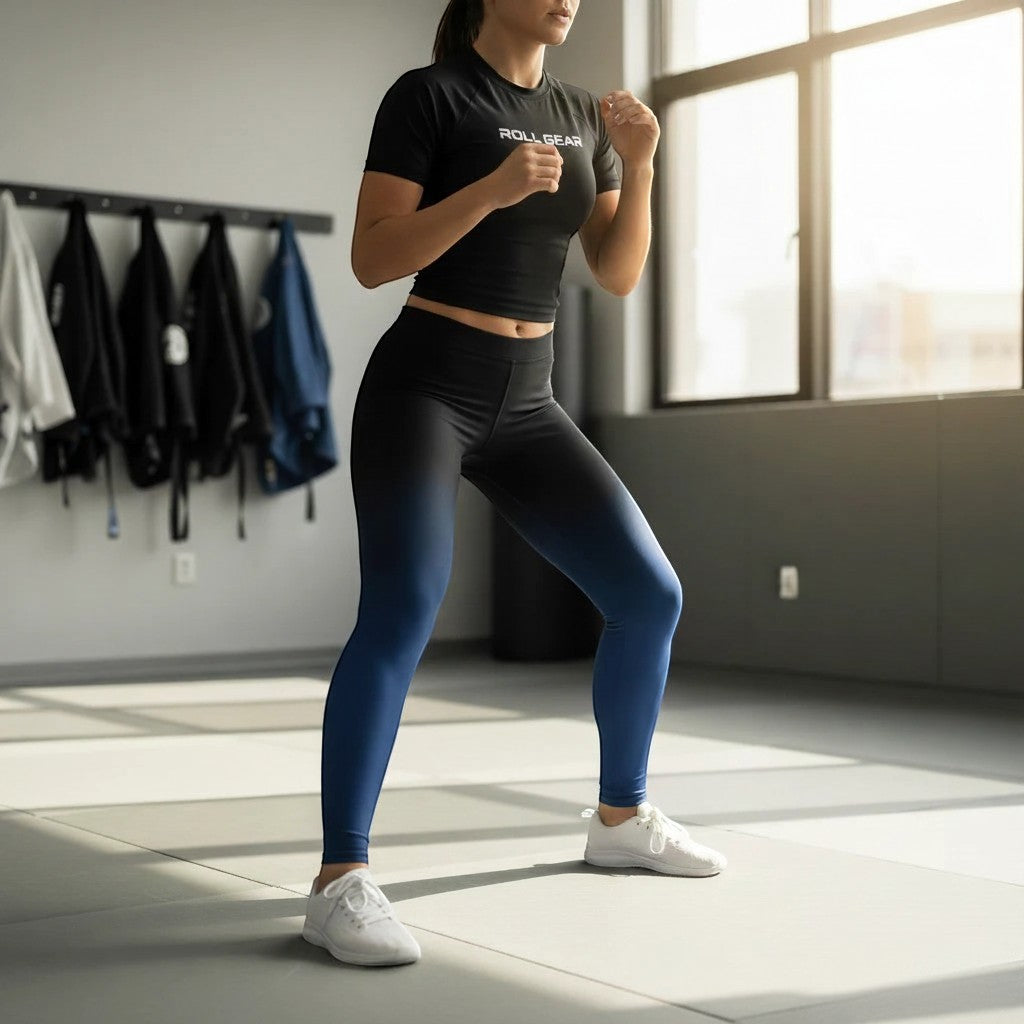 Roll Gear women's blue and black gradient compression training spats, ideal for MMA, wrestling, and BJJ.
