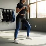 Roll Gear women's blue and black gradient compression training spats, ideal for MMA, wrestling, and BJJ.