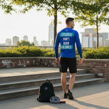 Roll Gear Excuses Don’t Burn Calories Men’s Long Sleeve Rash Guard – Blue, back view on a man walking outdoors.