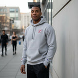 Roll Gear Champion grey heather cotton-blend hoodie with red logo on chest and sleeve, kangaroo pocket.