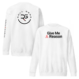 Roll Gear white crewneck sweatshirt with "Give Me A Reason" graphic on front and circular logo on back.