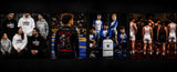 A wide collage of multiple sports team photos wearing apparel with the visible text 'EARNED NOT GIVEN' on black, white, and gray hoodies and sweatshirts, plus a central back view of a person wearing a black graphic hoodie with red text. The collage is set against a black background.