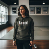 Roll Gear Earned Not Given Legacy Edition olive green hooded sweatshirt with white text graphic.
