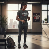 Roll Gear men's relaxed fit dark grey cotton t-shirt with "Earned Not Given" graphic.