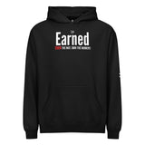 Roll Gear black hooded sweatshirt with "Earned" graphic and "OWN THE MAT. OWN THE MOMENT." slogan.