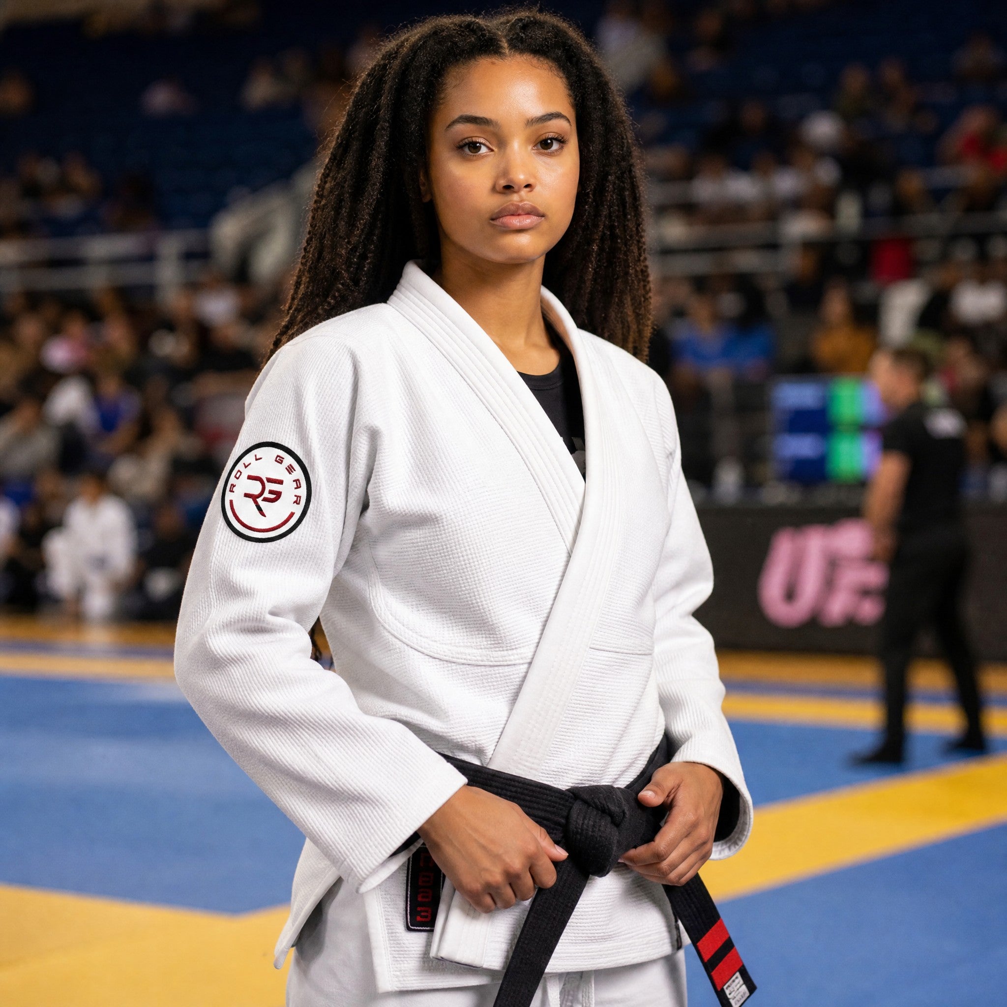 Roll Gear Embroidered Patch – Red & White, girl in a gi wearing the patch at a tournament.