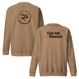 Roll Gear tan crewneck sweatshirt with "Give Me A Reason" graphic on front and circular logo on back.