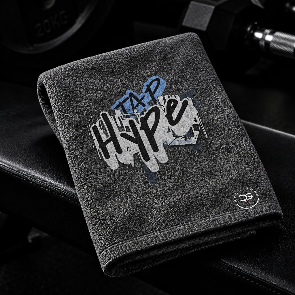 Roll Gear HYPE Sweat Rag in grey, folded towel with the Tap Hype graphic in a gym.