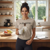 Roll Gear Jiu Jitsu Mom tee in light beige, 100% cotton, featuring a graphic of a woman with coffee and a yellow belt.