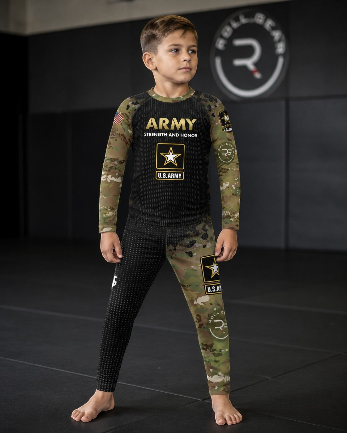 Roll Gear Kids Army Long Sleeve Rash Guard, boy standing in the rash guard and camo spats.