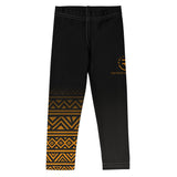 Roll Gear Lion's Pride Kids BJJ Spats – Black & Gold, flat back view, tribal print.
