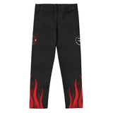 Roll Gear black polyester-spandex compression spats for kids with red flame graphics and firefighter emblems.