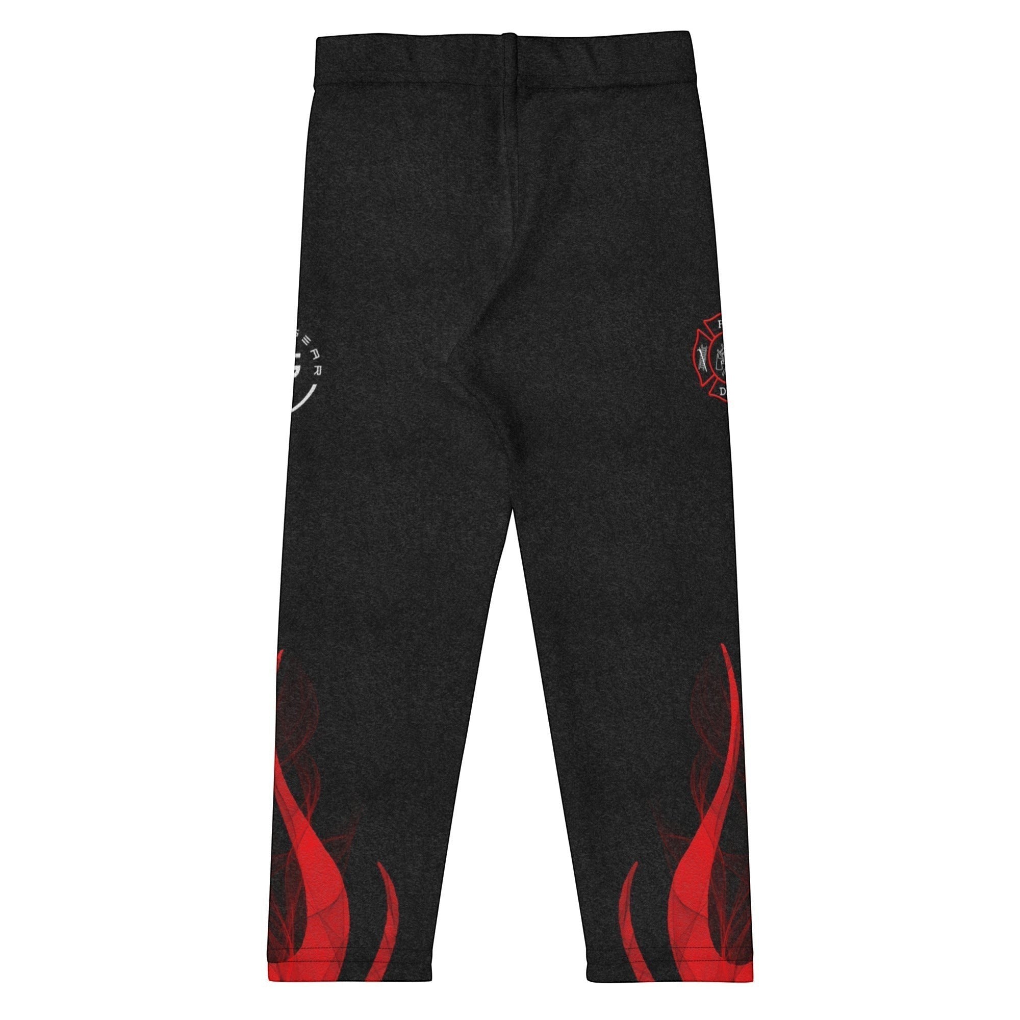 Roll Gear black compression spats for kids with red flame graphics and firefighter emblems. Four-way stretch polyester-spandex blend.