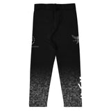 Roll Gear Kids SWAT Compression Spats in black with an urban fade tactical pattern and SWAT graphics. Made from polyester and spandex.