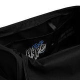 Black polyester Roll Gear LLC training duffel bag with "Earned Not Given" graphic and motivational text.