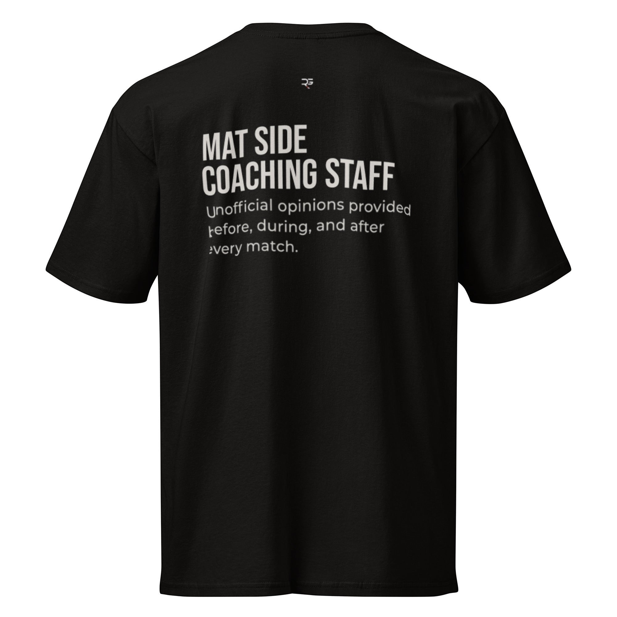Black heavyweight tee, flat back view, Mat Side Coaching Staff print with the unofficial-opinions line in cream.