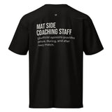 Black heavyweight tee, flat back view, Mat Side Coaching Staff print with the unofficial-opinions line in cream.