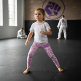 Roll Gear girls pink microfiber spats with all-over bow pattern, elastic waistband, for gymnastics and play.