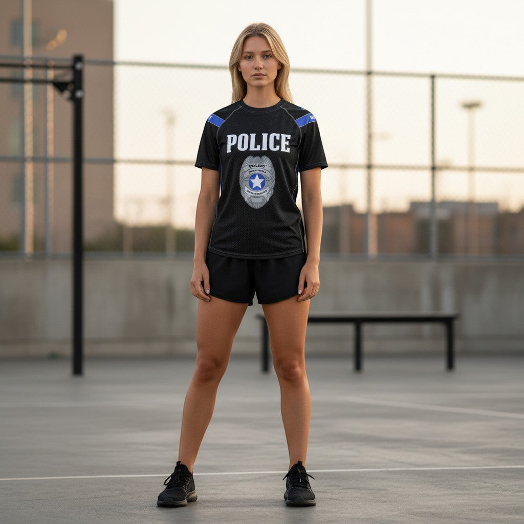 Roll Gear Unisex Police Edition short sleeve rash guard in black with blue accents and police badge graphic. Compression fit.