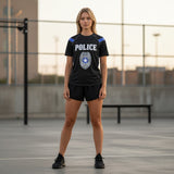 Roll Gear Unisex Police Edition short sleeve rash guard in black with blue accents and police badge graphic. Compression fit.