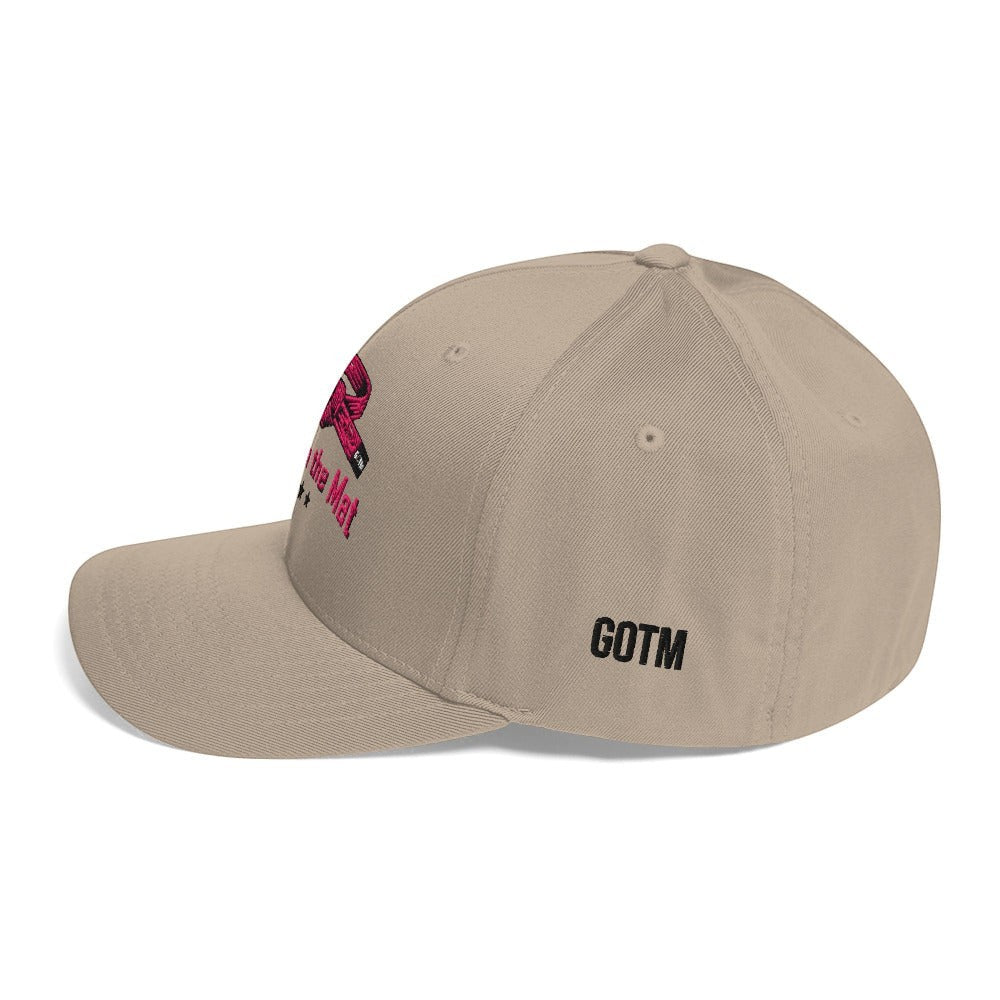 Roll Gear tan baseball cap with pink embroidered belt graphic and "Girls on the Mat" text, GOTM logo on side.