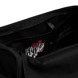 Black polyester Tap Hype training duffel bag by Roll Gear LLC with bold graphic detail and motivational text.