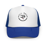 Roll Gear trucker hat with white front panel and blue mesh back. Features embroidered logo.