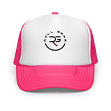 Roll Gear trucker hat with white front panel, embroidered logo, and hot pink mesh back and bill. Adjustable snapback.