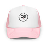 Roll Gear trucker hat with white front panel, pink brim, and mesh back. Features embroidered logo.