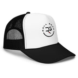 Roll Gear trucker hat with white front panel, black mesh back, and embroidered logo. Curved bill.