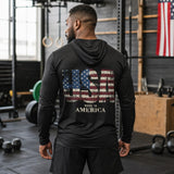 Roll Gear black hooded long sleeve shirt with distressed USA flag graphic and "MADE IN AMERICA" text.