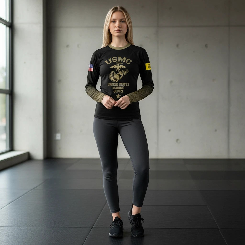 Roll Gear Youth Marines Gold military rash guard in black with faded gold sleeves and USMC emblem. Long sleeve, compression fit.