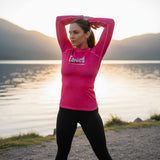 Roll Gear women's long sleeve rash guard in hot pink with all-over pattern. Athletic fit, moisture-wicking fabric.