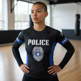 Roll Gear Women's Police Edition long sleeve rash guard in black with blue accents and "POLICE" graphic.