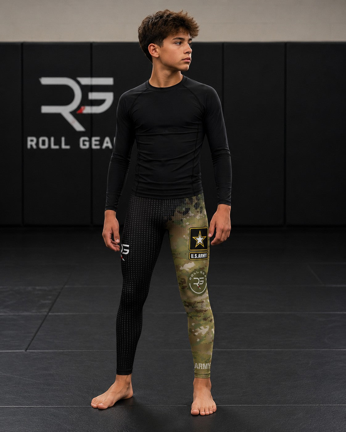 Roll Gear Youth Army Compression Spats in black and military camo with U.S. Army graphics. Polyester/spandex blend.