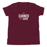 Roll Gear Youth Earned Not Given T-Shirt in maroon with white and red text graphic. Short sleeve, crew neck.