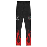 Roll Gear youth compression spats in black with red flames and fire department logo. Made of polyester and spandex.