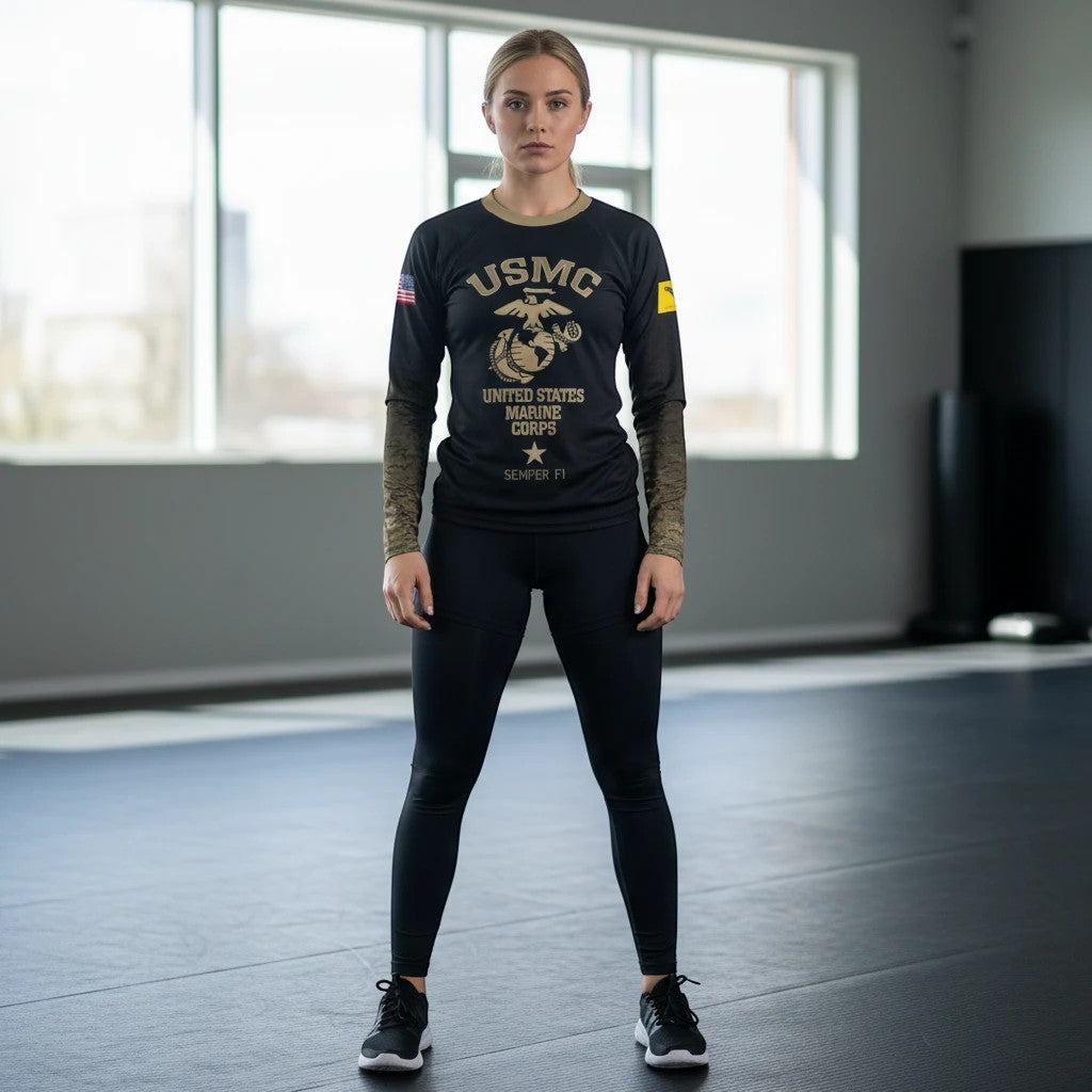 Roll Gear Youth Marines "Gold" long sleeve rash guard in black with faded gold sleeves and USMC emblem. Compression fit for athletic training.