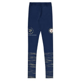 Roll Gear youth navy compression spats with ocean camo print on lower legs and insignia detail. Made of polyester and spandex.