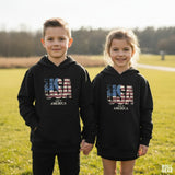 Roll Gear black youth performance hoodie with USA flag graphic and "Made in America" text. Athletic fit.