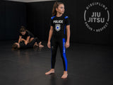 Roll Gear youth black compression spats with blue thin line panels and police graphics, ideal for BJJ and wrestling.