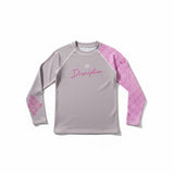 Roll Gear youth performance rash guard in grey with pink accents and long sleeves, featuring a 'Discipline' graphic.