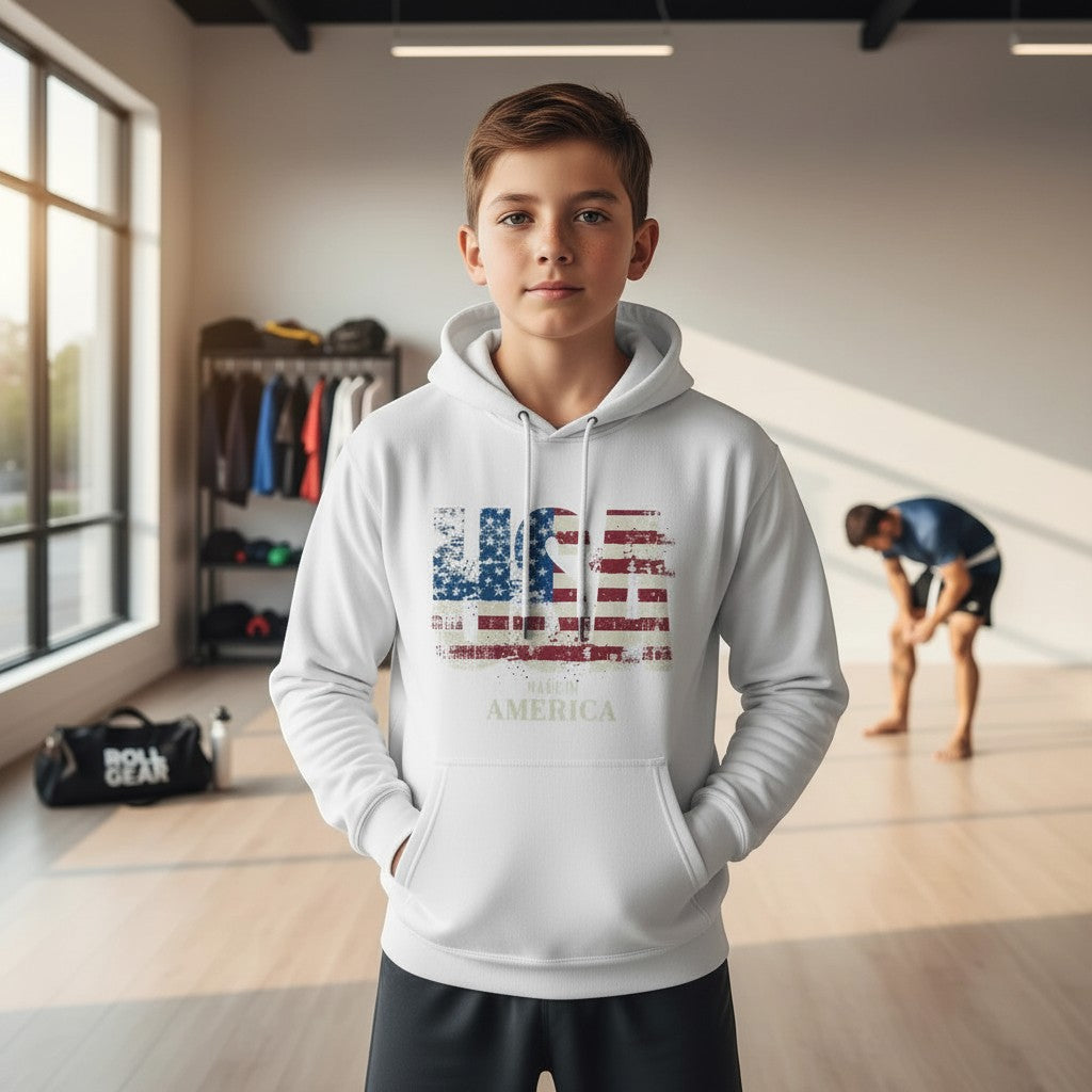 Roll Gear white youth performance hoodie with distressed USA flag graphic and "Made in America" text.
