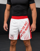 Roll Gear Own the Mat BJJ Fight Shorts – Red & White, close-up front view on a model.