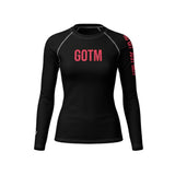 Roll Gear Women's black long-sleeve BJJ rash guard with red GOTM logo and text detail on sleeve.
