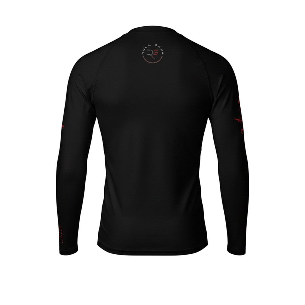 Roll Gear black long sleeve youth performance rash guard with red graphic on sleeve and logo on back.