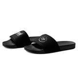 Roll Gear black women's slides with cushioned footbed and durable sole. Features slip-on design and branding.