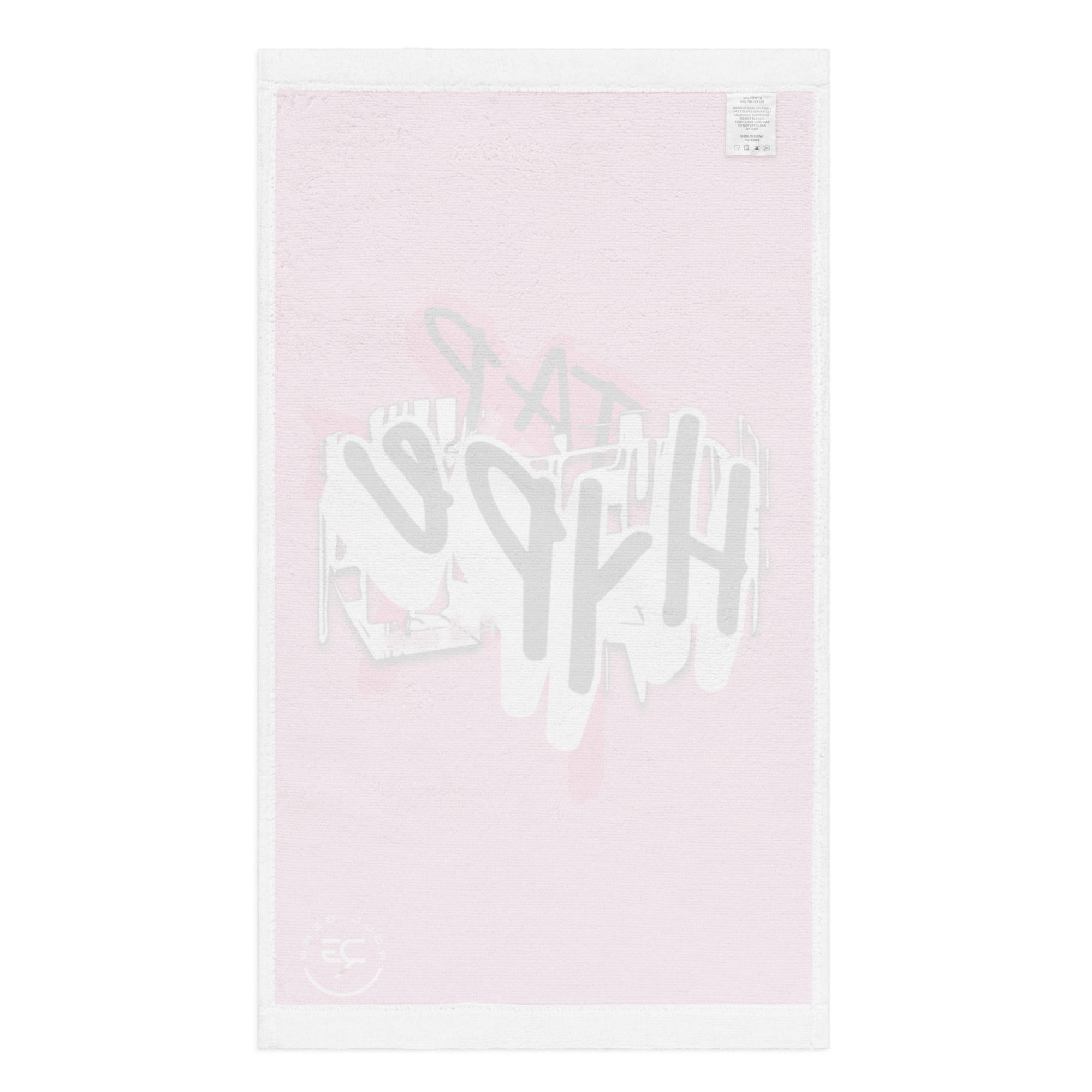 Roll Gear HYPE training towel in pink with white graffiti print. Soft polyester front, absorbent cotton back, 16" x 28".