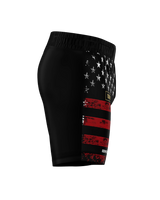 Roll Gear LLC USMC grappling shorts in black with distressed American flag design on the side. Long cut for full coverage.