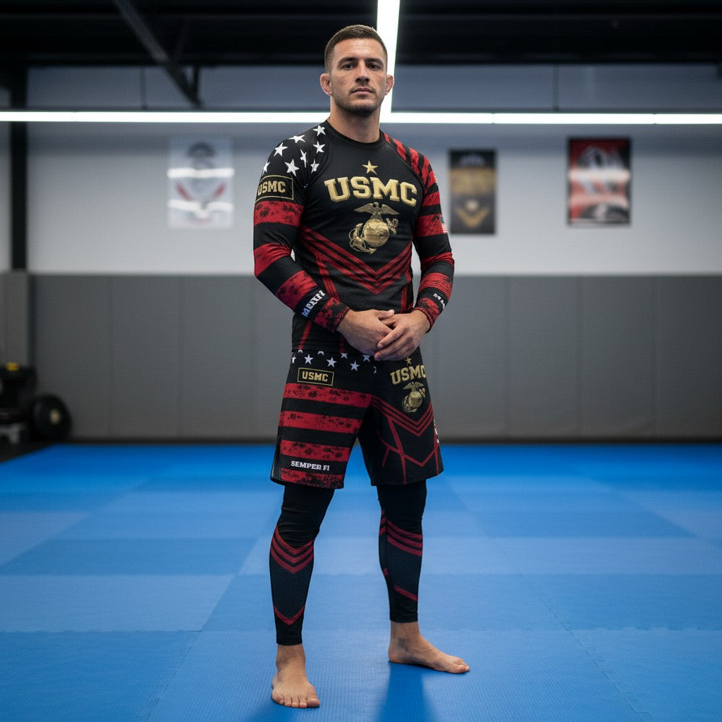 Roll Gear LLC USMC grappling shorts in black and red with USMC and Eagle Globe and Anchor graphics. Long cut with split leg for mobility.
